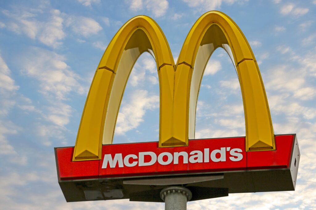 McDonalds's logo on top of a restaurant