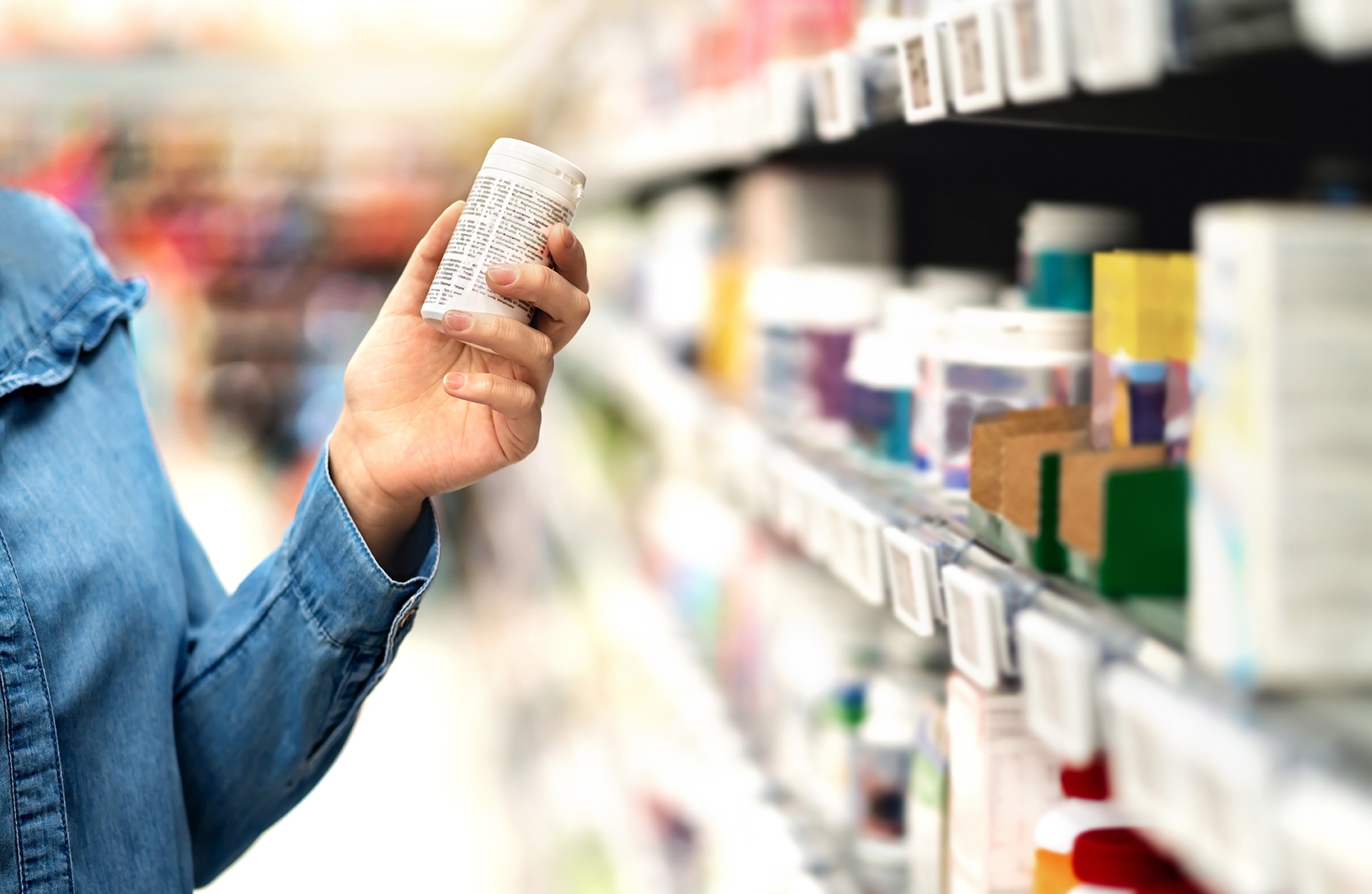 person holding a medicine package