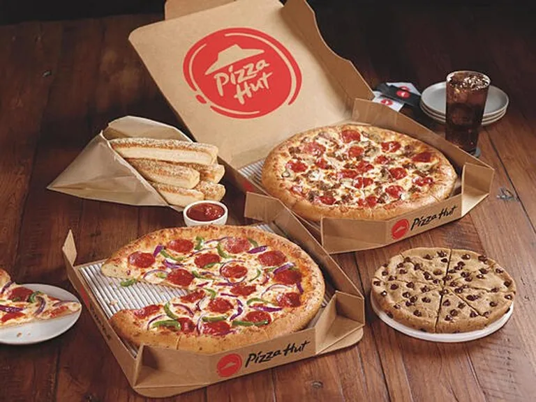 Pizza Hut pizzas in open boxes